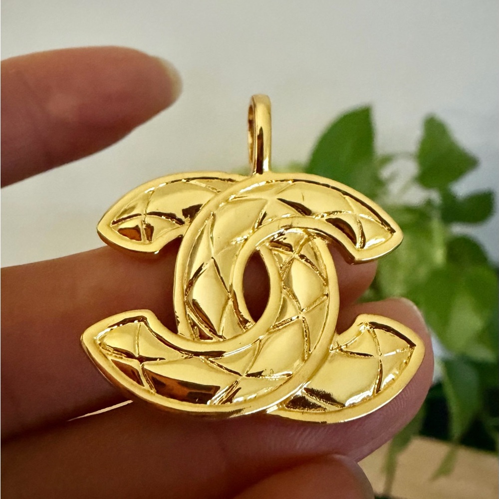 Authentic CHANEL Gold Logo Pendant